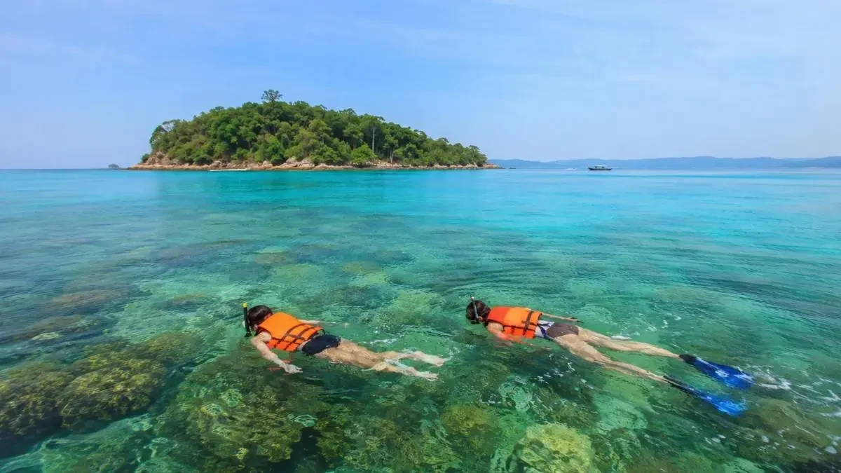Snorkeling in the clear waters around Neil Island